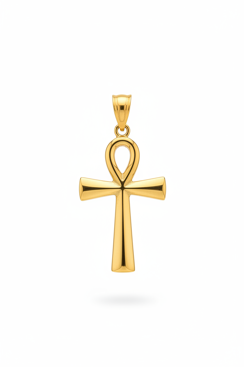 A polished yellow gold pendant shaped like an ankh cross, featuring a smooth, reflective finish and a top bail for a chain, shown against a plain white background.
